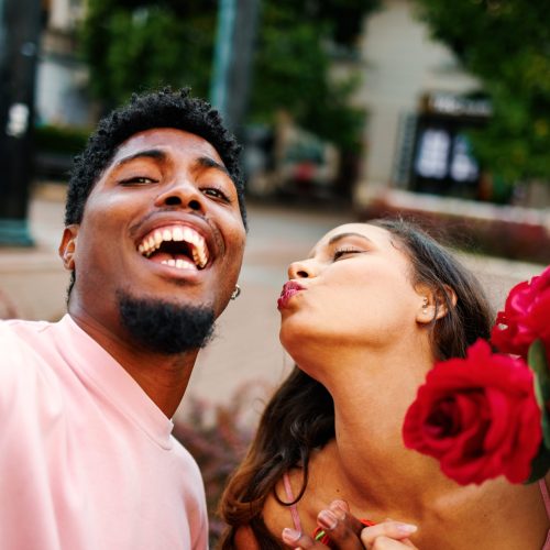 Young happy couple taking a selfie on the street Young happy couple taking a selfie on the street